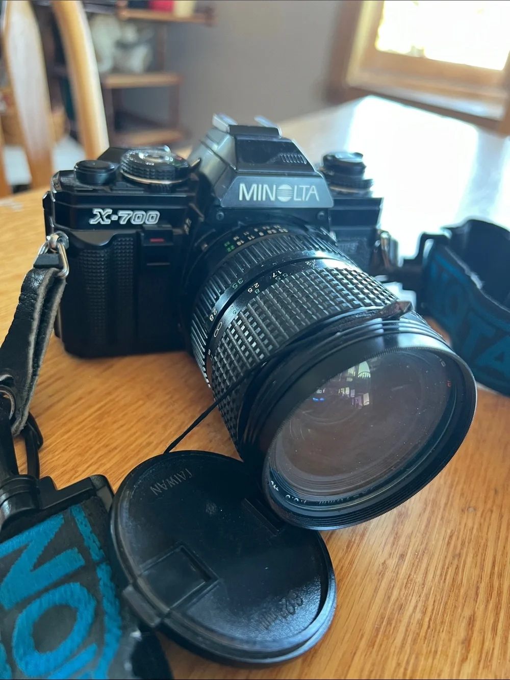 Minolta X-700 Film Camera with Black/Blue Strap, lens, adapter, auto thyristor